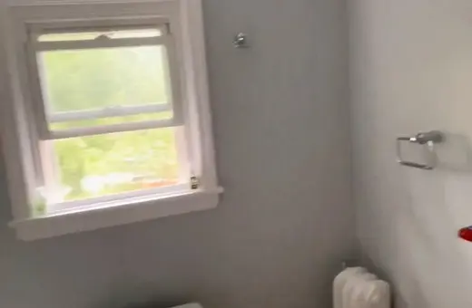 Outdated bathroom remodeled into a modern, updated space