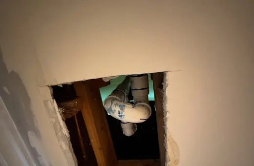 Ceiling crack repairs completed using joint compound for a smooth, seamless finish