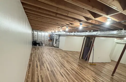 1,200 sq ft of Jamestown Hickory luxury vinyl plank flooring installed in a Piscataway, NJ home