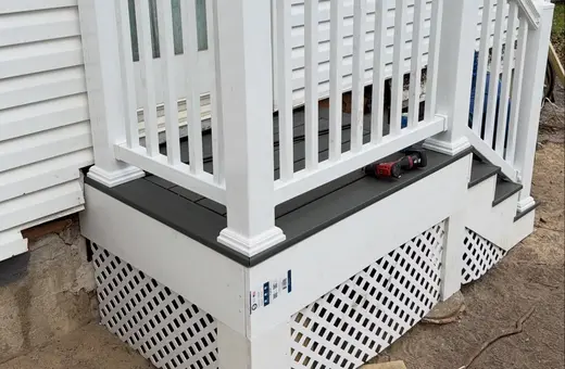 Trex composite deck landing with a picture-framed border and top-mount railings for a clean, modern look