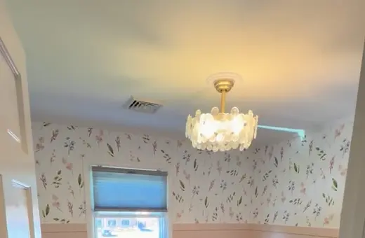 Room makeover in Somerville, NJ featuring new wallpaper and custom wainscoting and trim work