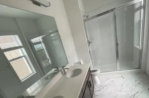 Bathroom makeover using luxury vinyl plank flooring for an affordable, upscale look