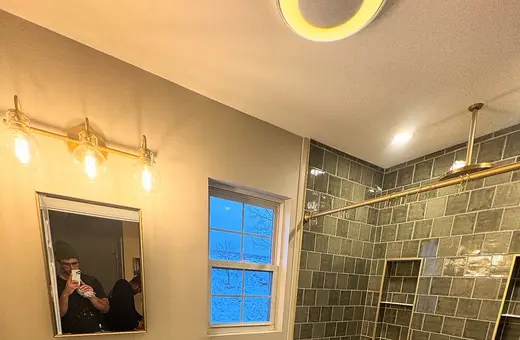 Full shower-to-tub conversion featuring a new deep soaking tub for a spa-like bathroom